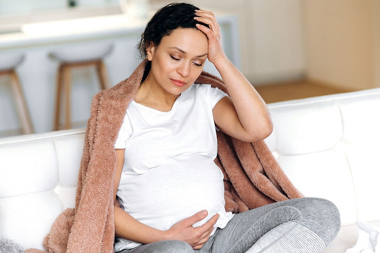 Depression During Pregnancy (Antepartum Depression) – Pregnant Woman Holding Head